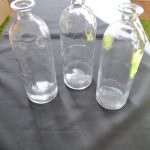 3 glazen flessen
