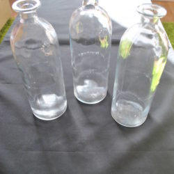 3 glazen flessen