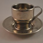 Cappuccinokop en schotel RVS