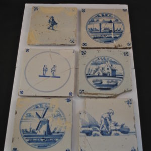 15 antieke tegels (beschadigd)