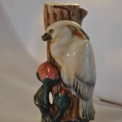 Bloemvaasje (vogel tegen stam)