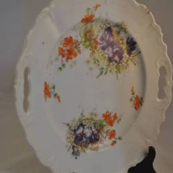 Gebakschaal met oranje en blauwe bloemetjes; 26 cm.