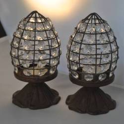 2 waxinelichthouders (metaal, glas)