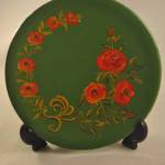 Plat houten bordje, groen (volkschilderkunst)