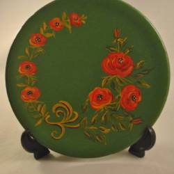 Plat houten bordje, groen (volkschilderkunst)