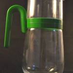 Schenkkan, glas, groene handgreep